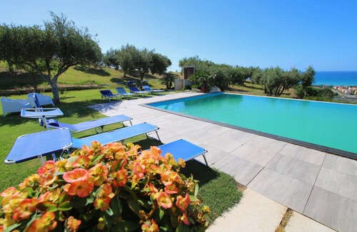 Campofelice di Roccella Villa | Large property, 2 Modern Villas, PRIVATE POOL, Golf Practice, Sea View, WIFI