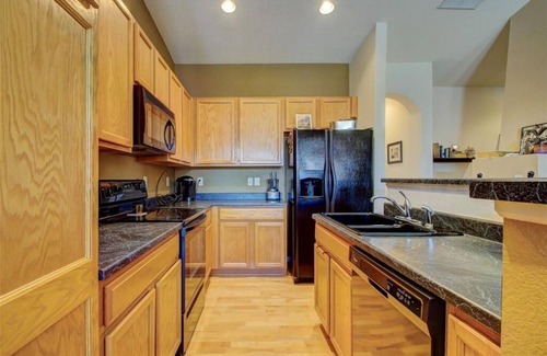 Aurora Condo | Large Private Saddle Rock Condo with a 2 car Tandem Garage