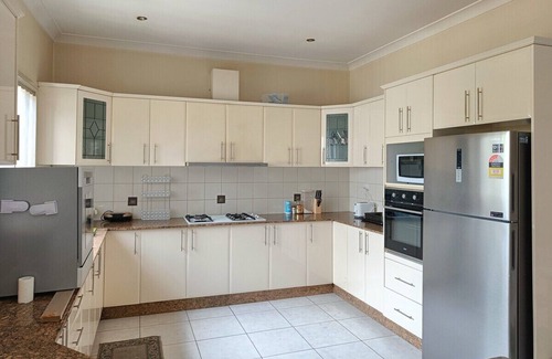 Merrylands House | Large Queen Bedroom with Air Conditioner