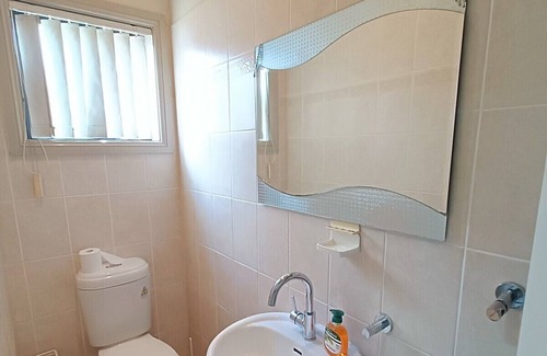 Merrylands House | Large Queen Bedroom with Air Conditioner