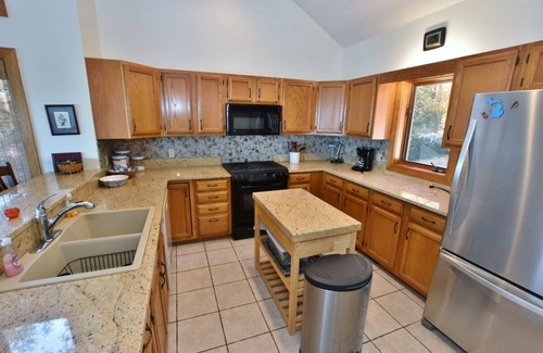 Suttons Bay House | Last minute special for next week! Sport court