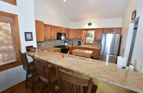 Suttons Bay House | Last minute special for next week! Sport court