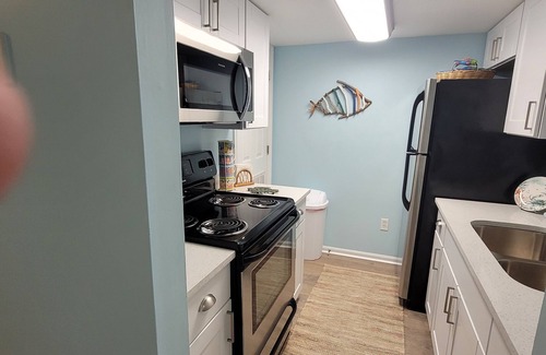 Surfside Beach Condo | Leave your worries behind in this cozy getaway right on the beach!