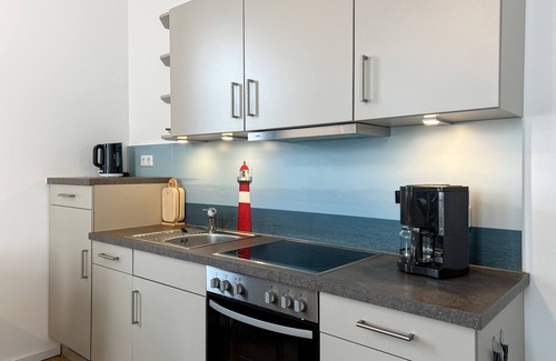 Borkum Apartment | Leuchtturmblick: Moderne Ferienwohnung für Zwei auf Borkum