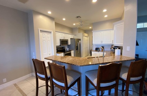 Tropical Cove Villa | Lexington Country Club Villa, 3 bedroom 2 bath, extended lanai with water view