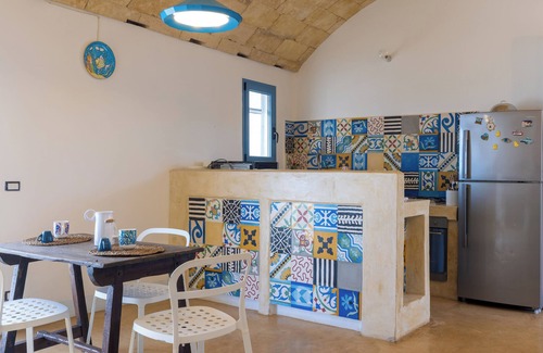 Torre Pali Villa | LiAMA Detached villa surrounded by greenery with panoramic sea views.