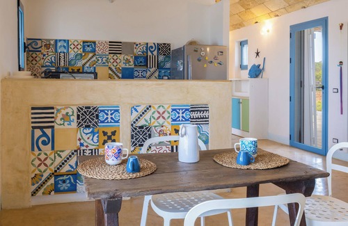 Torre Pali Villa | LiAMA Detached villa surrounded by greenery with panoramic sea views.