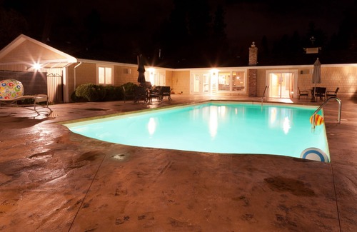 Southeast Kelowna House | Licensed Kelowna Retreat with pool and pickleball, private midtown acreage