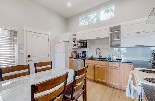 Bells Beach House | Light-filled home with Puget Sound view, great deck, fenced yard & fireplace