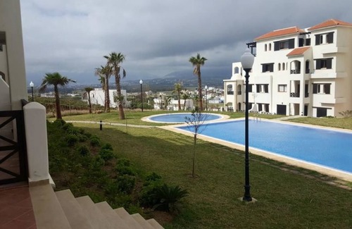 Cabo Negro Apartment | Lilac's garden Vue piscine