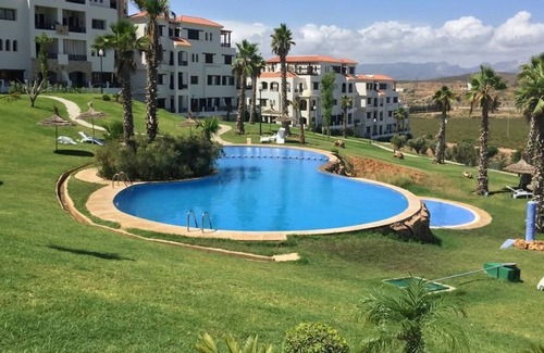 Cabo Negro Apartment | Lilac's garden Vue piscine
