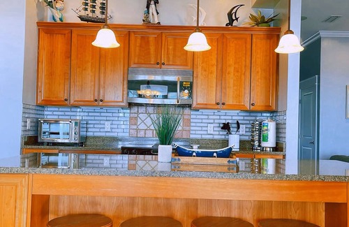 Carrabelle House | Lily’s Escaped, Private screen cover pool, fishing dock,