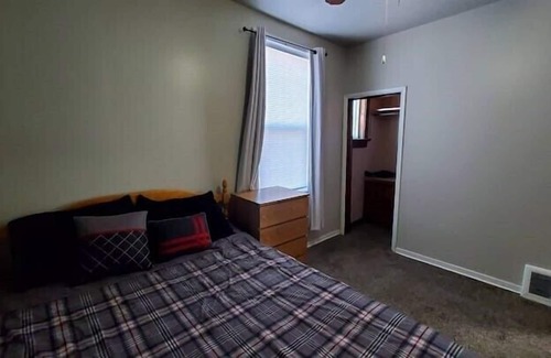 Two Rivers Apartment | Live. Work. Play. Charming Riverfront Apt in Two Rivers!