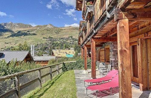 Verbier Apartment | Living room with Swedish fireplace, open kitchen with vitroceram, dishwasher, Nespresso machine and