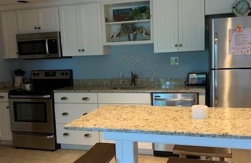 Wells Condo | Located just steps from Wells Beach, Eastwinds 124 is perfect for your getaway.