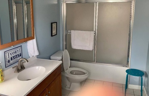 Calico Rock House | Lockie Lodge, rustic A frame style home with open concept.