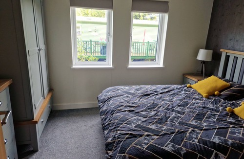 Llanfair Caereinion Cabin | Lodge - Sleeps 6, hot tub & pet friendly
