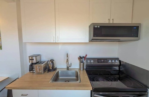 Ste Anne de Beaupre Apartment | Loft 11 | 2 Min Waterfront | BBQ & Fireplace