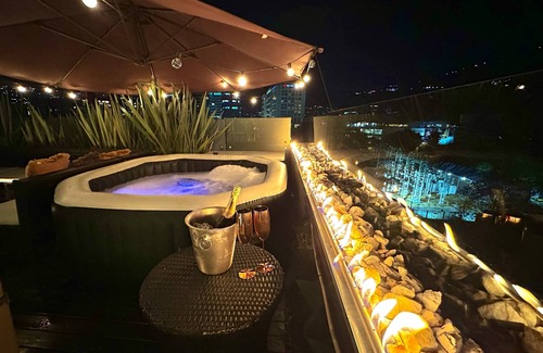 Santa Ana Apartment | Loft + private terrace with jacuzzi, fireplaces, cinema, panoramic view
