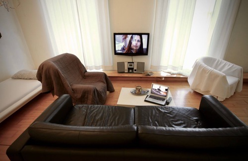 Oberhausen Apartment | Loft with parquet and designer lights by Ingo Maurer - attractive and stylish