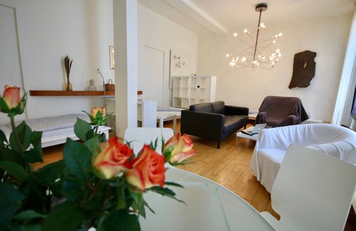 Oberhausen Apartment | Loft with parquet and designer lights by Ingo Maurer - attractive and stylish