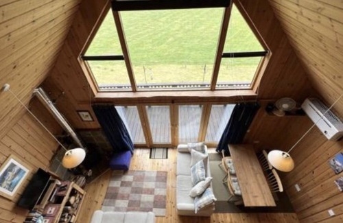 Dallavich Cabin | LOG CABIN Master Galleried Bedroom 2 Bathrooms Wood Burner Loch & Mountain Views