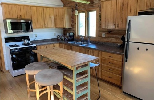 Fremont Cabin | Log Cabin on the channel to Lake Poygan