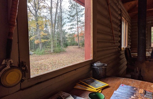 Gerrish Township Cabin | LOG CABIN W/SAUNA ON THE CUT RIVER AT HIGGINS LAKE