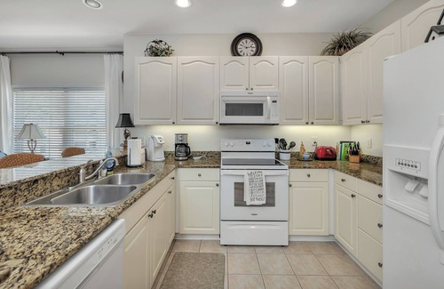 St. Simons Island Condo | Long distance marsh views and community pool.