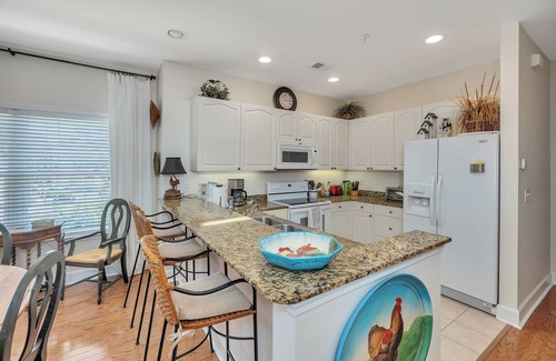 St. Simons Island Condo | Long distance marsh views and community pool.