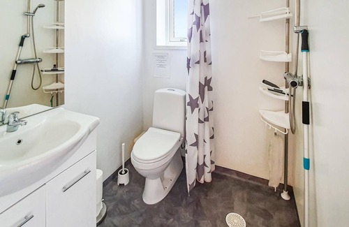 Svanesund Apartment | Look forward to a wonderful view of the Halsöfjord from this vacation home.