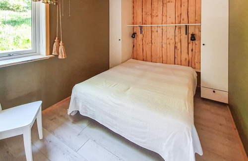 Svanesund Apartment | Look forward to a wonderful view of the Halsöfjord from this vacation home.