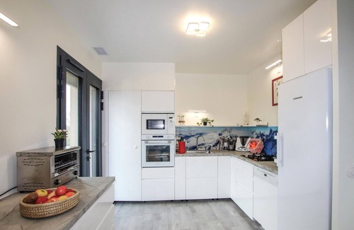 Saint-Romans House | Look forward to spending your vacation in this vacation home with outdoor hot tub.