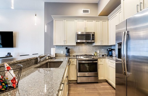 Central Business District Condo | Look No Further! Glam + Historic Charmer + Large Private Balcony = Everything! | The Calliope