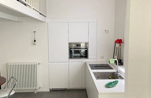 Loreto Apartment | Loreto White Loft | 15min from Duomo