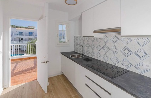 Arenal d'en Castell Condo | Lovely 2-bedrooms condo just 300 mts from beach