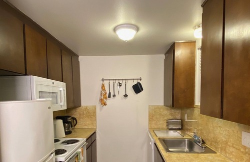 West Woodland Condo | Lovely 2-bedroom condo with fireplace and patio