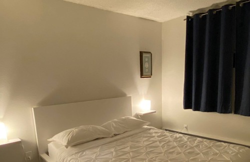 West Woodland Condo | Lovely 2-bedroom condo with fireplace and patio
