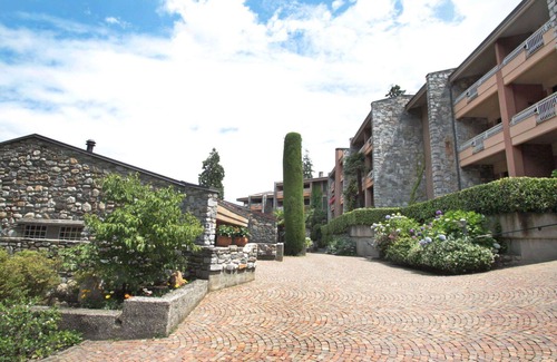 Porto Valtravaglia Apartment | Lovely apartment for 6 guests with pool, WIFI, TV and patio