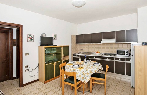 Frader Apartment | Lovely apartment for 4 guests with A/C, WIFI, pool, TV, terrace and parking