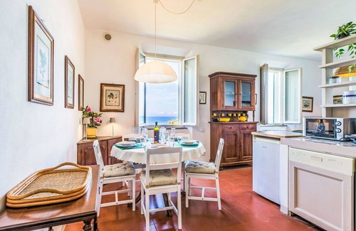 Rosignano Marittimo Apartment | Lovely apartment for 7 people with WIFI, pool, TV and patio