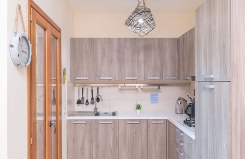 Porto Pozzo Apartment | Lovely apartment for 4 people with WIFI, pool, A/C, terrace, pets allowed and parking