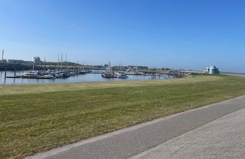 Norddeich Apartment | Lovely apartment for 2 people with WIFI, TV, balcony and parking