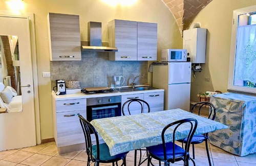 Cecina Apartment | Lovely apartment for 3 guests with pool, WIFI, A/C, TV, pets allowed and parking