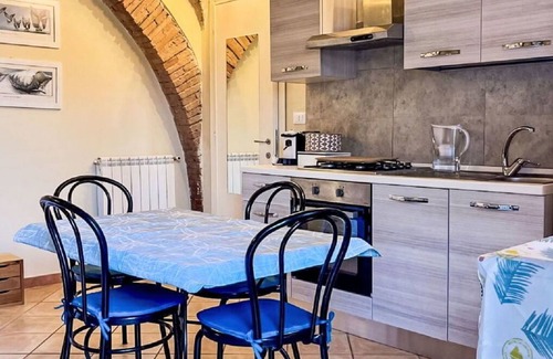 Cecina Apartment | Lovely apartment for 3 guests with pool, WIFI, A/C, TV, pets allowed and parking
