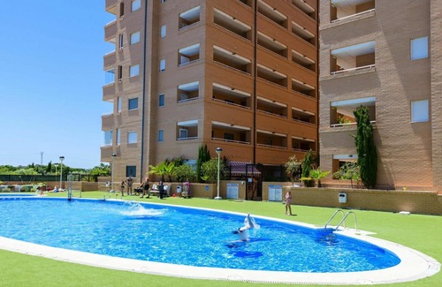 Cabanes Apartment | Lovely apartment for 4 guests with pool, A/C, TV, terrace, pets allowed and parking