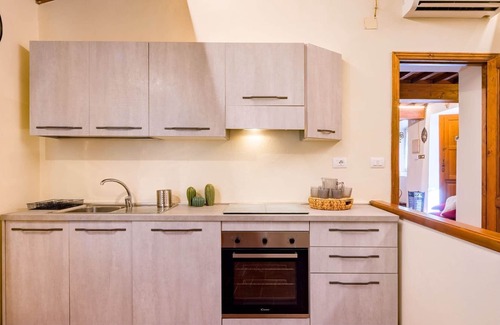 Pieve al Bagnoro Apartment | Lovely apartment for 6 guests with pool, WIFI, A/C, TV, pets allowed and parking