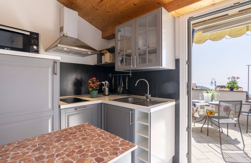 Terzorio Apartment | Lovely apartment for 4 guests with A/C, WIFI, balcony, panoramic view and parking