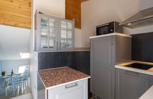 Terzorio Apartment | Lovely apartment for 4 guests with A/C, WIFI, balcony, panoramic view and parking