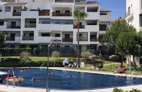 La Cala de Mijas Apartment | Lovely apartment in Alamar with pool, balcony & wi-fi. Short walk to the beach.